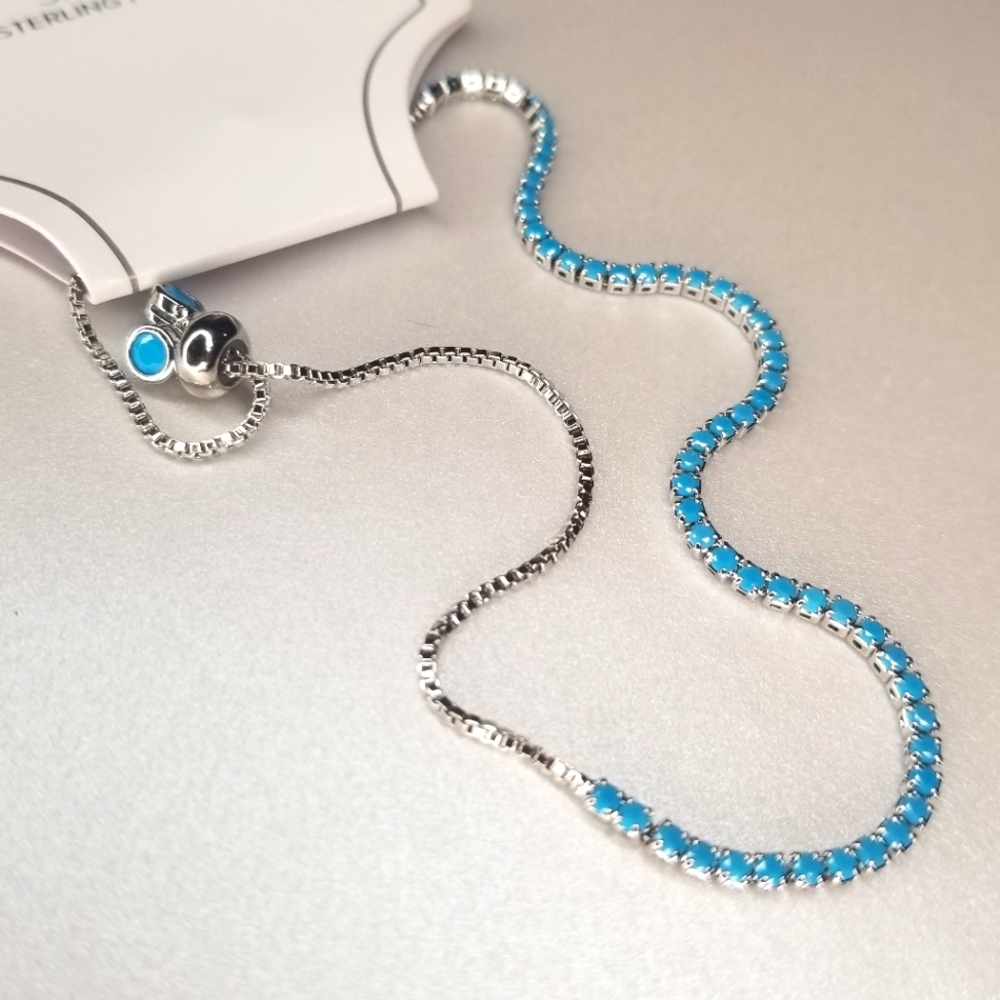 Bolo Bracelet, Rhodium plated Sterling Silver with Aqua/Turquoise CZs